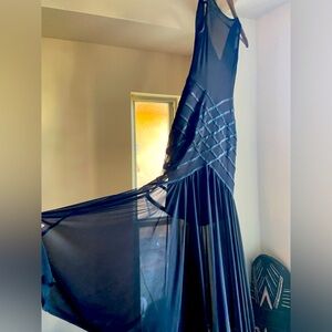 Show stopping black sheer gown with cowl back and ribbon detailing